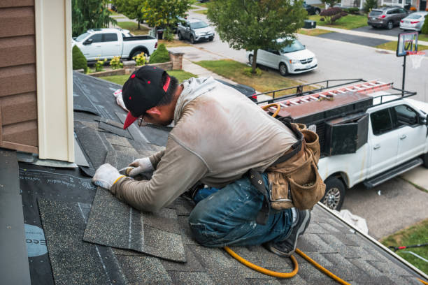 Professional Roofing technician working in Wampsville, NY